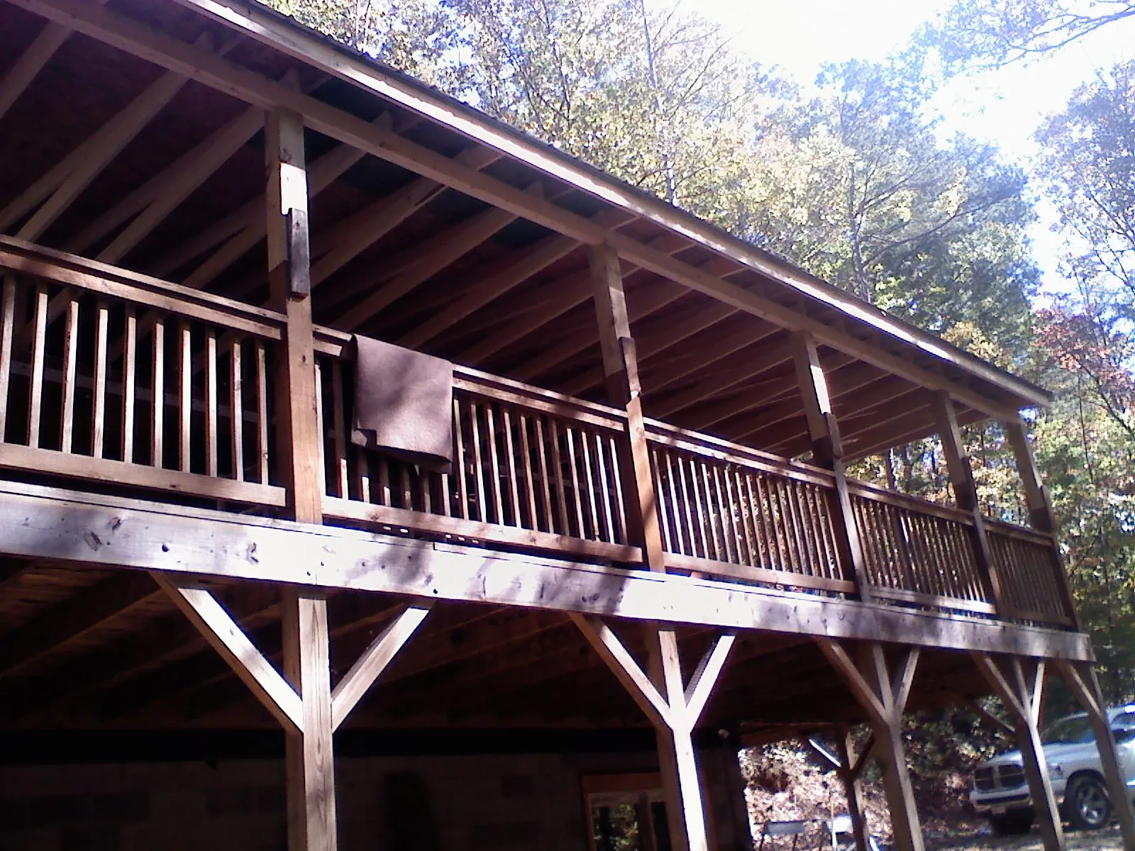 Timber framing under a new elevated porch and deck — Roof Leak Repair in Floral Park by Roofing Brothers